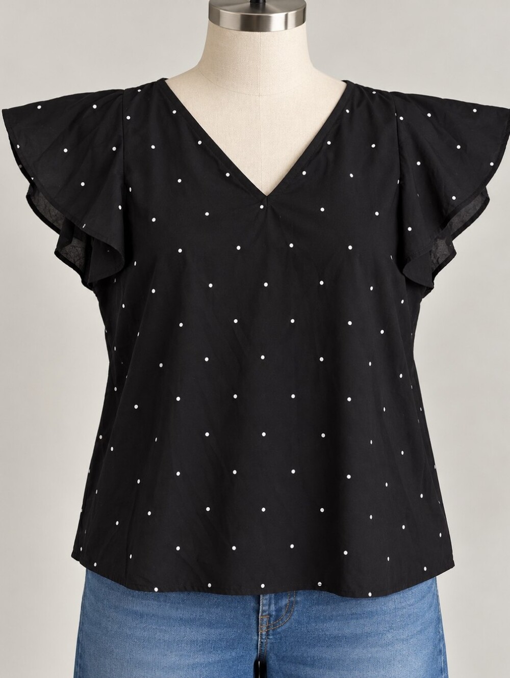 Ricki's | Black Polka Dot Flutter Sleeve Top with Back Tie Detail
